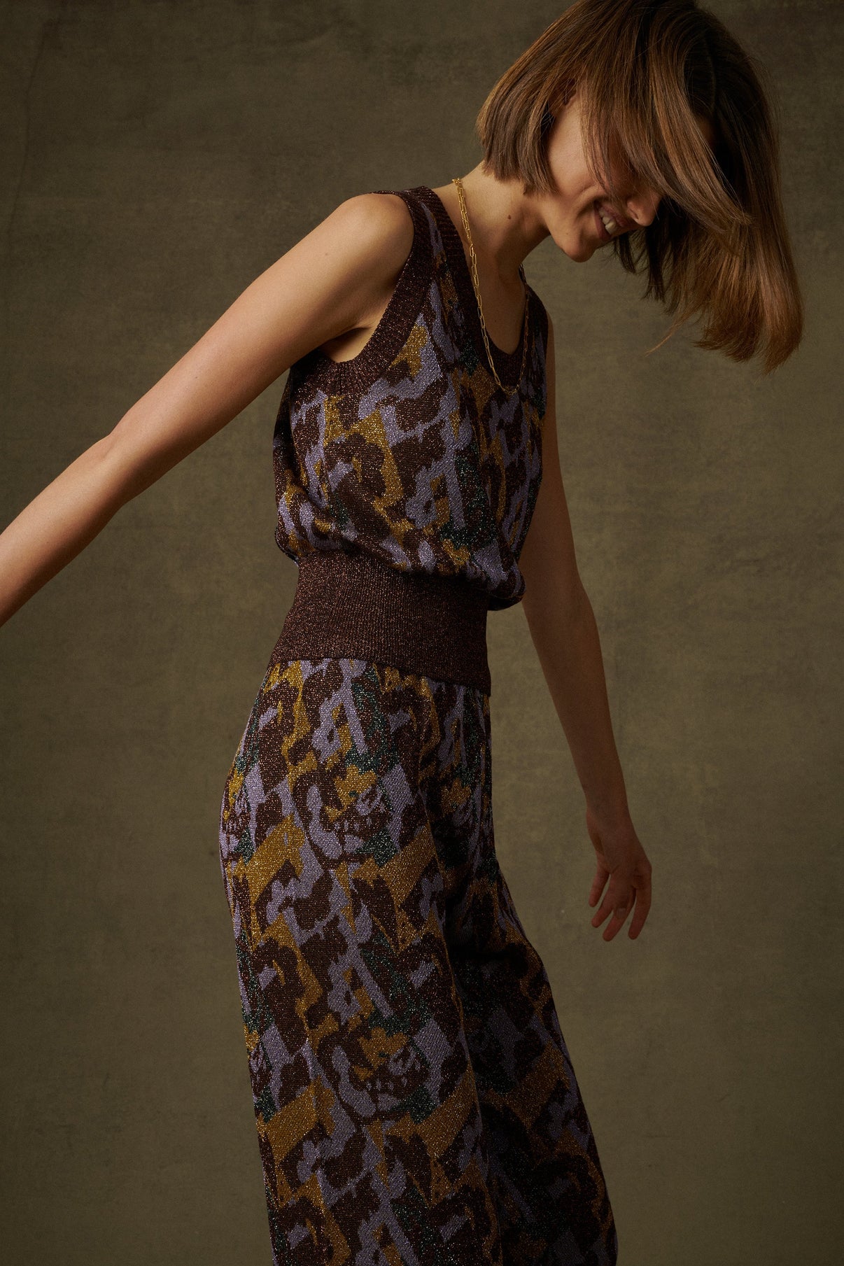 CAMISETA SIN MANGAS DE PUNTO PETON MORADO vue 1